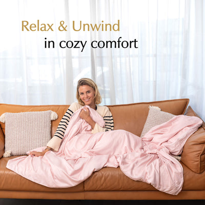 relax and unwind in cozy comfort with weighted blanket cover pastel pink on a couch#color_Pastel-Pink