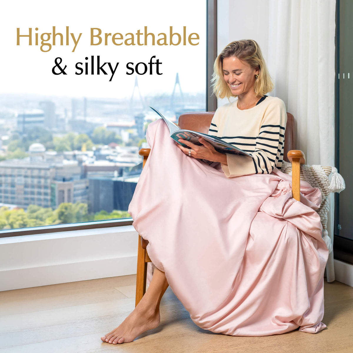 highly breathable and silky soft weighted blanket cover pastel pink on a chair