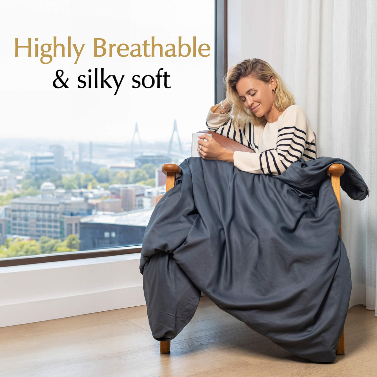 highly breathable and silky soft weighted blanket cover charcoal grey on a chair